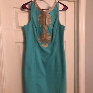 Lilly Pulitzer sea blue and gold shift dress.
